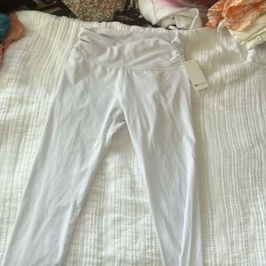 White leggings, size large, brand new with tags, never worn